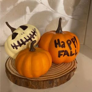 Hand made pumpkin fall decor on small round wood